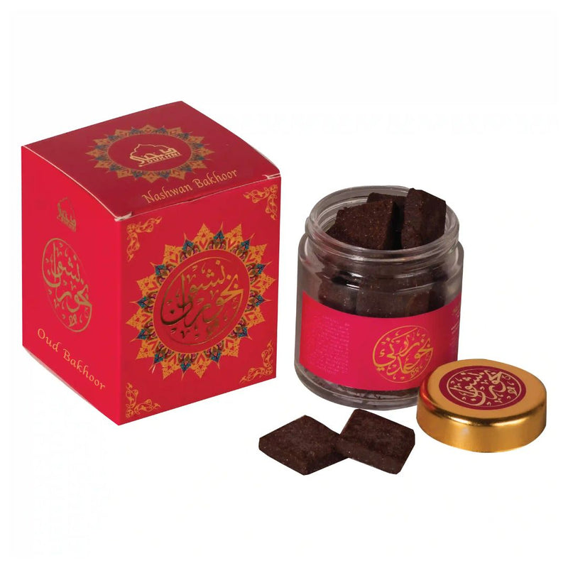 Oudh Bakhoor product with red box and gold lid on a white background
