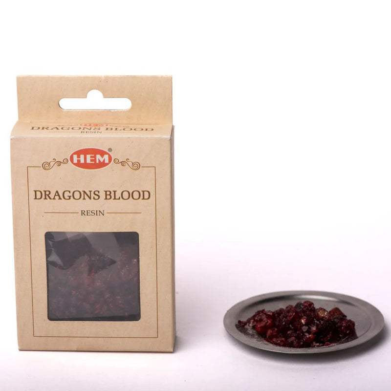 Hem brand packaging of dragons blood resin with a small dish of resin on a white background