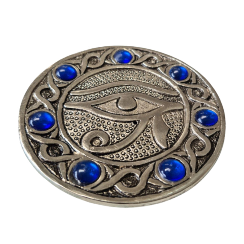 Metal Eye of Horus incense holder on white background