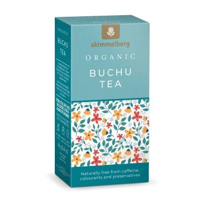 Box of Skimmelberg Organic Buchu Tea displayed against a backdrop of South Africa's lush Cape region, emphasizing its antioxidant-rich and sustainable qualities.