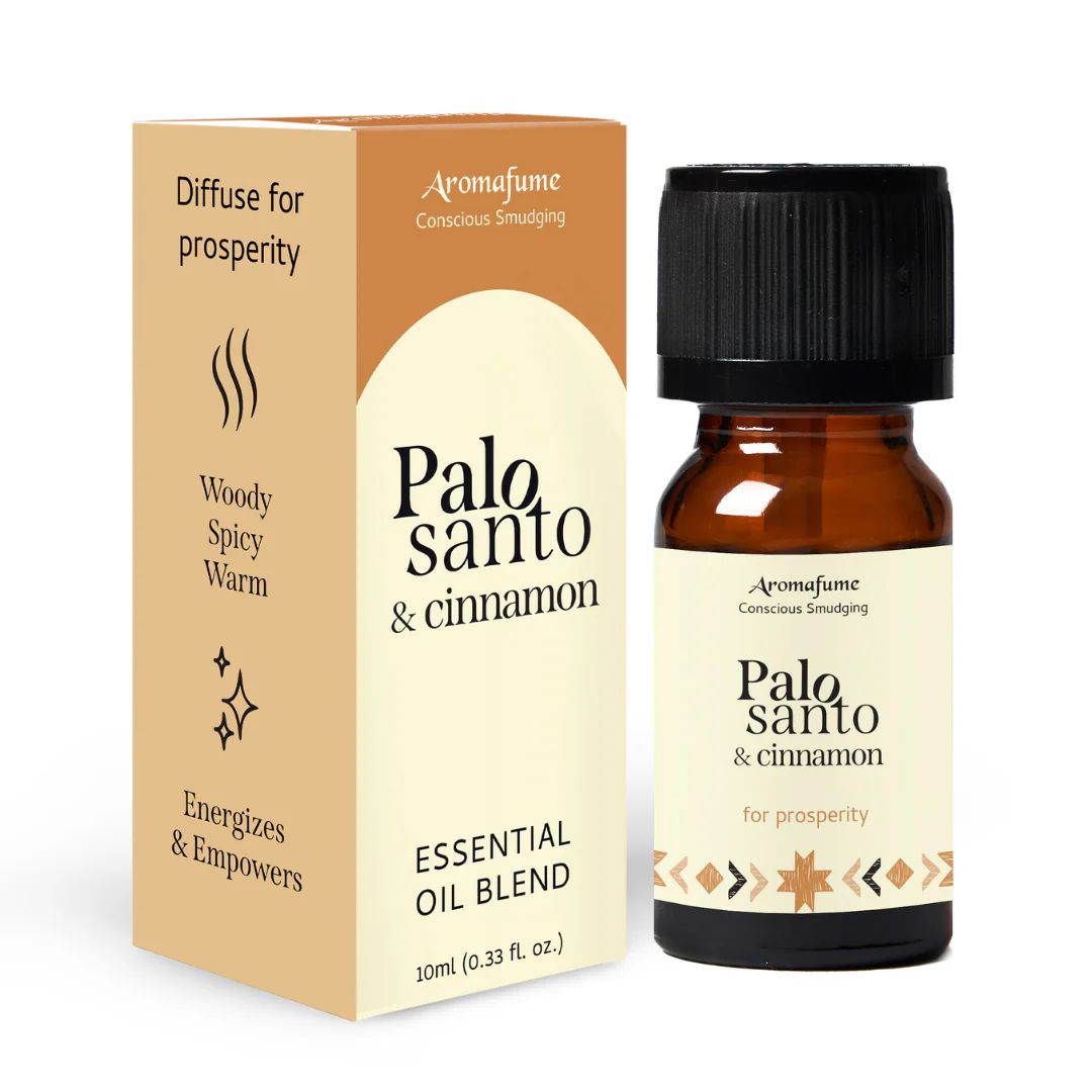 Amber glass bottle of Palo Santo and Cinnamon essential oil blend