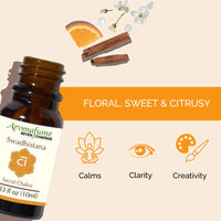 Amber bottle of Aromafume Sacral Chakra essential oil blend