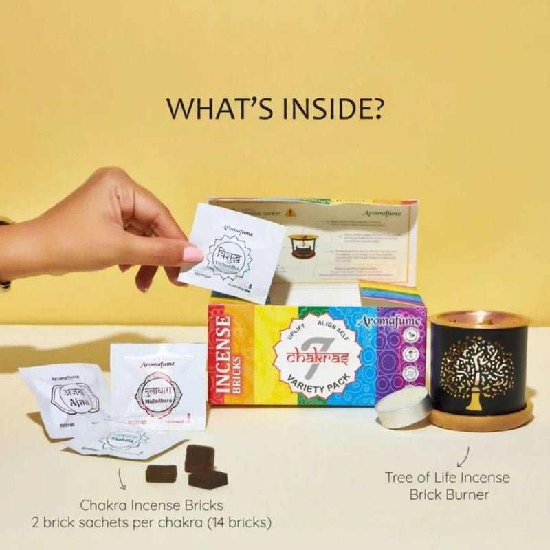A hand reaching into a box labeled '7 Chakras Variety Pack' with incense products on a yellow background.