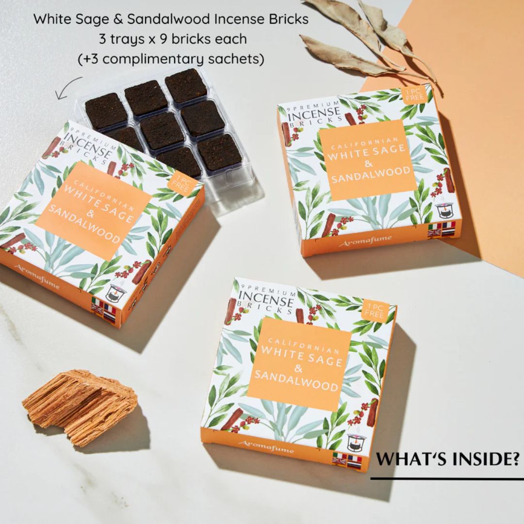 Three boxes of White Sage & Sandalwood Incense Bricks with incense sticks on a light background