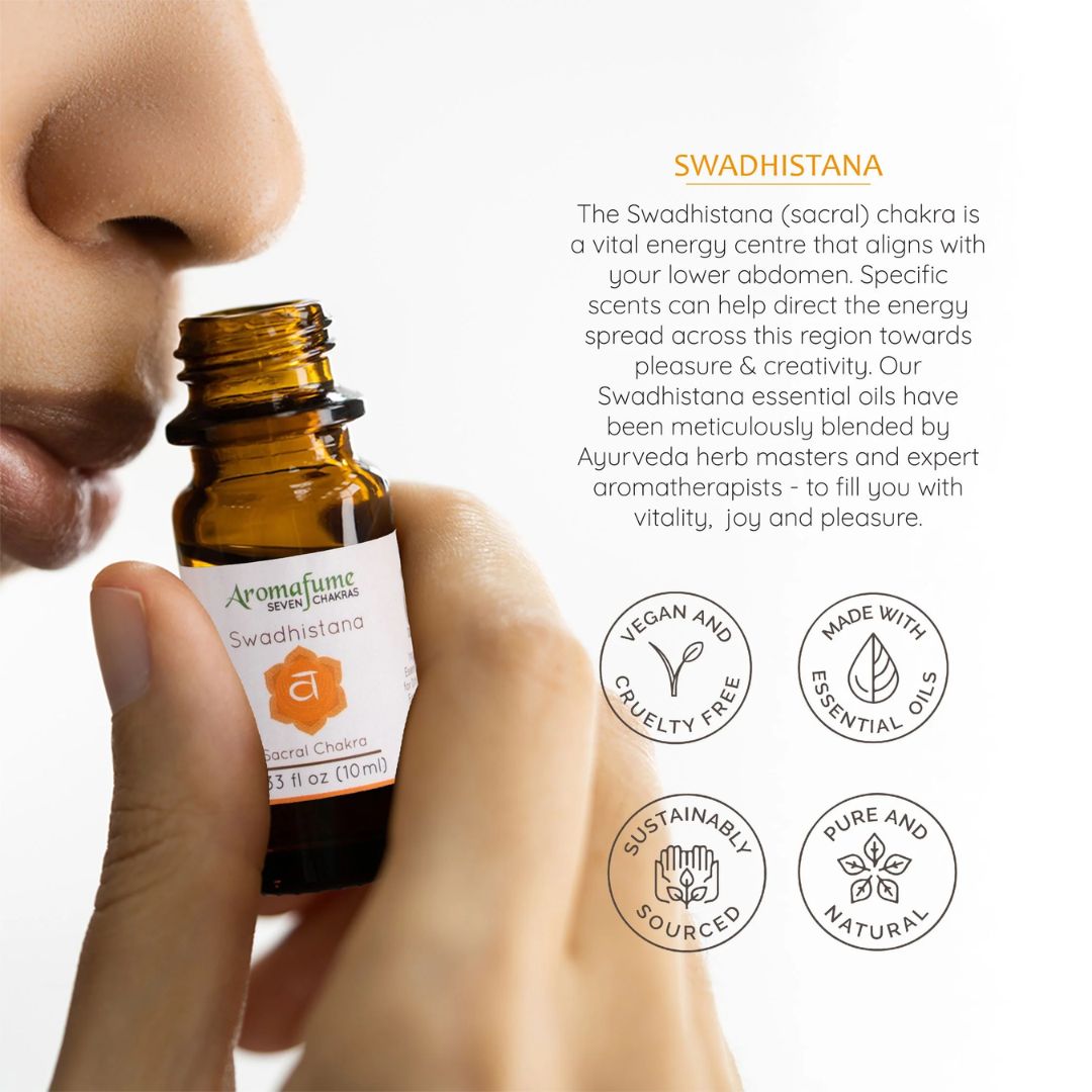 Amber bottle of Aromafume Sacral Chakra essential oil blend