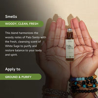 Palo Santo and White Sage oil on wooden background