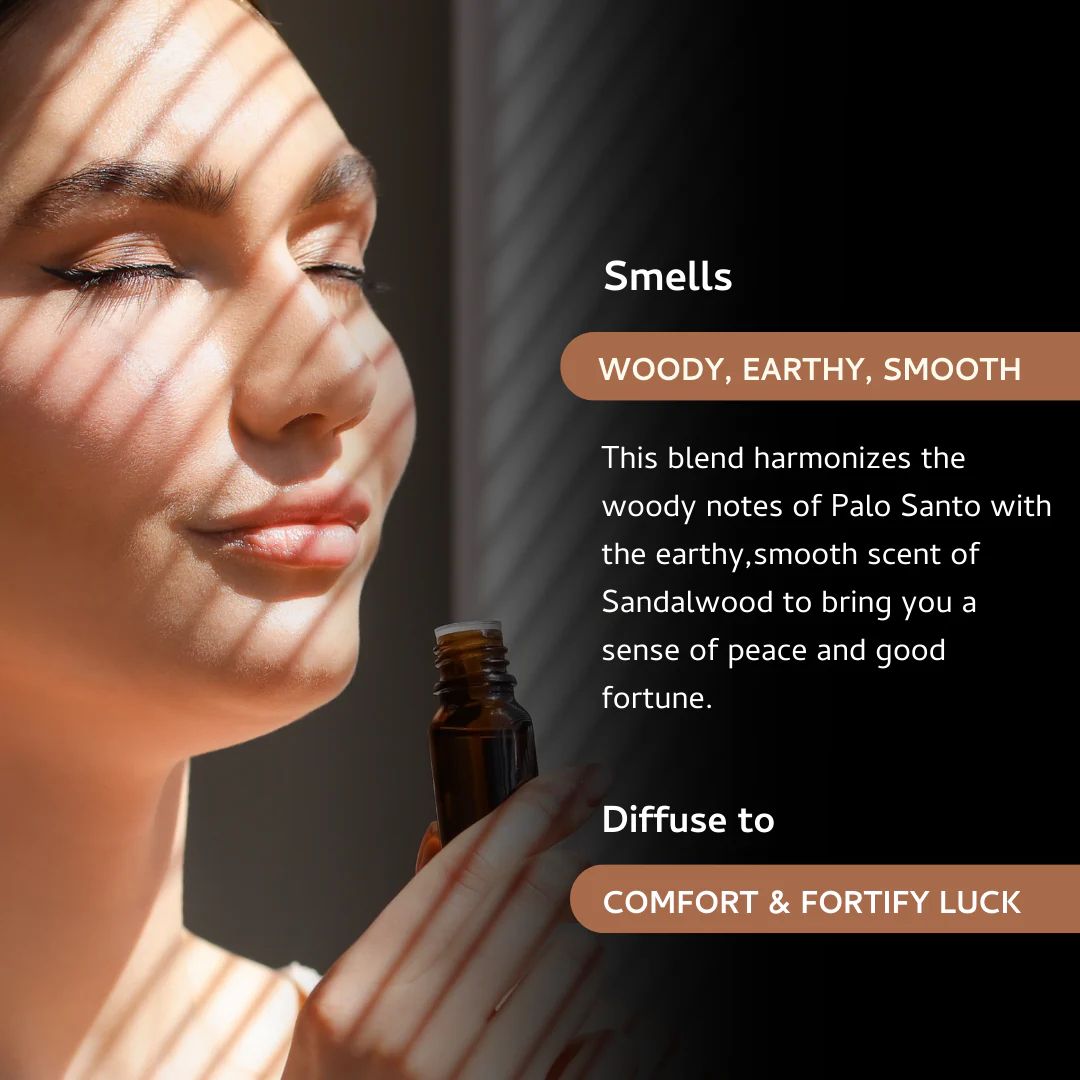 Amber glass bottle of Palo Santo and Sandalwood essential oil blend