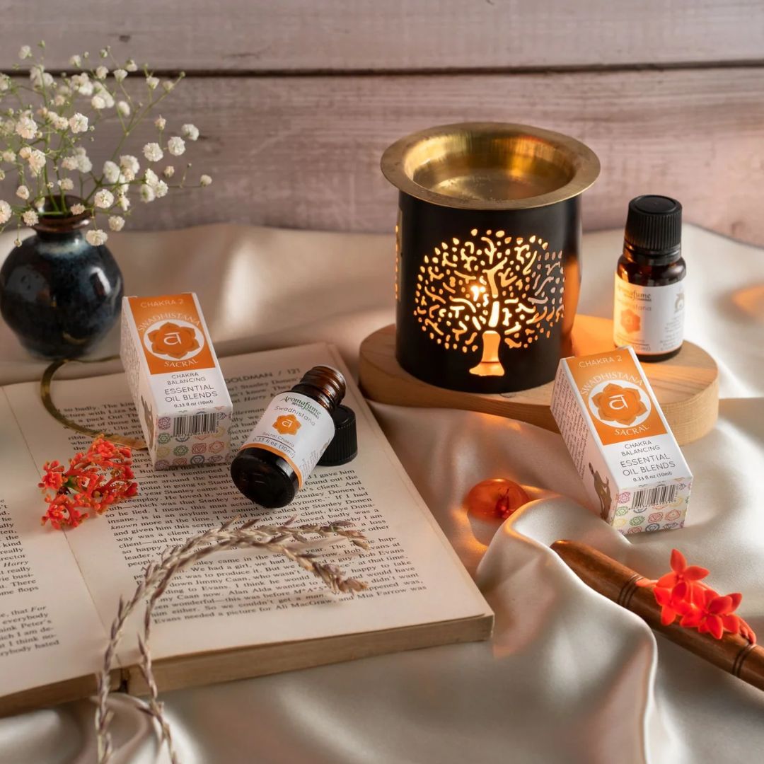 Amber bottle of Aromafume Sacral Chakra essential oil blend