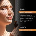 Amber glass bottle of Palo Santo and Cinnamon essential oil blend
