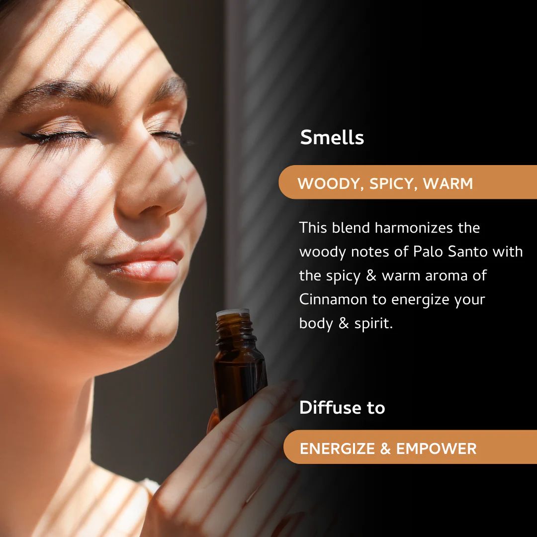 Amber glass bottle of Palo Santo and Cinnamon essential oil blend