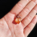 Citrine Pendant in Hand – Small Golden Gemstone for Solar Plexus Chakra Activation