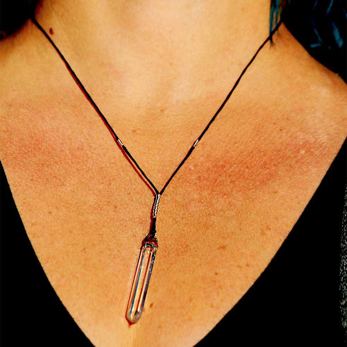 Clear Quartz crystal pendant — clarity and amplification