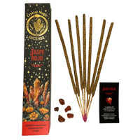 Incense sticks with packaging labeled 'Crystal Magic Incense Jaspe Rojo' on a white background