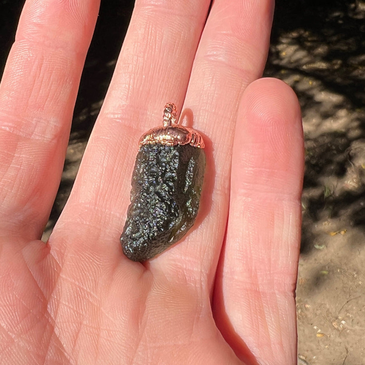 Genuine Moldavite Pendant in Hand – Ideal for Spiritual Growth