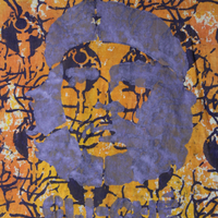 Orange and black tie dye shirt with face design