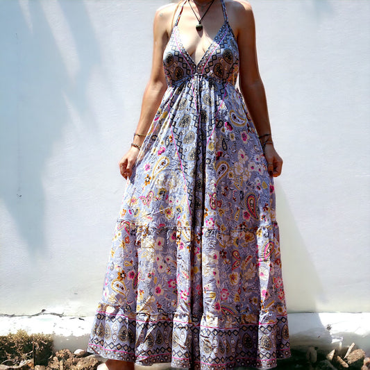 Woman in Secret Sense Bohemian Paisley Maxi Dress with intricate pastel patterns