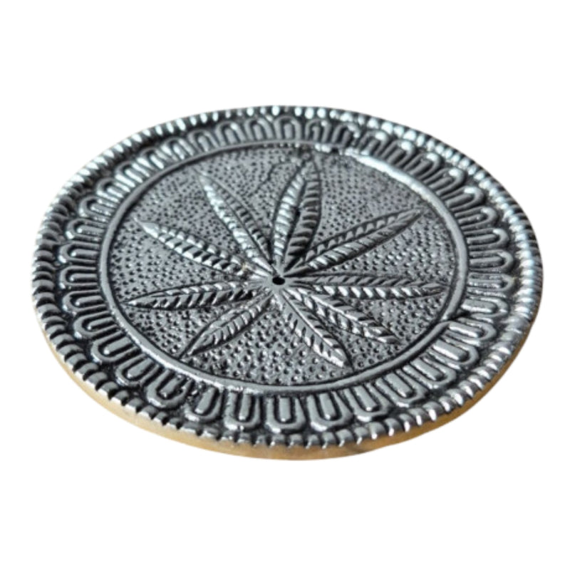 cannabis leaf-shaped incense holder in silver metal